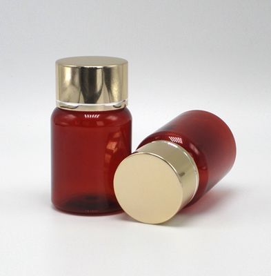 40 ml/1.3 oz Amber PET Pill Capsule Visolie Fles met zilveren aluminium schroefdop