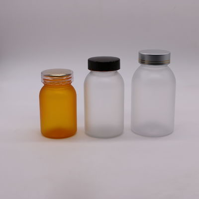 200 ml capsuleflessen met veiligheidsdop en pilcontainers in aangepaste kleur